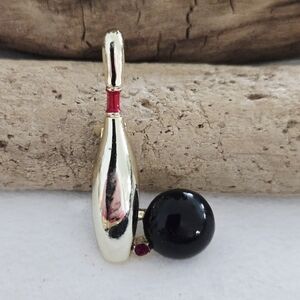 Vintage Gerrys Gold Tone and Black Enamel Bowling Pin Brooch